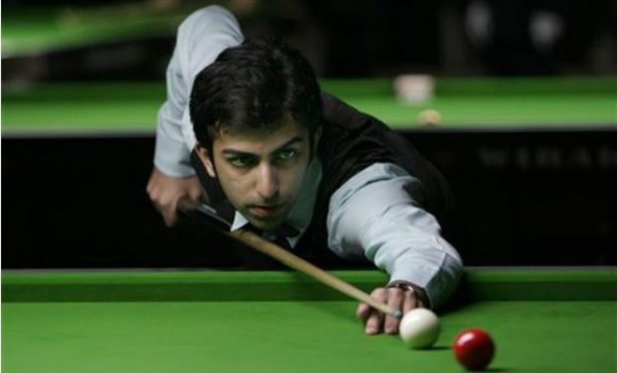 Advani advances to knockout of World Snooker Championship